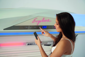 Prestige 1600 Hybrid Tanning Bed with advanced UV and Red Light Therapy technology"