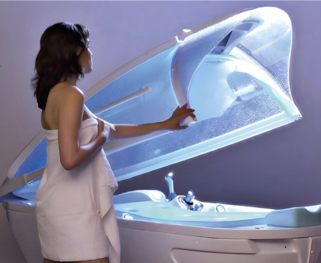 Woman using the Cocoon Hydration Station for skin hydration and wellness at SunScape Tanning & Wellness